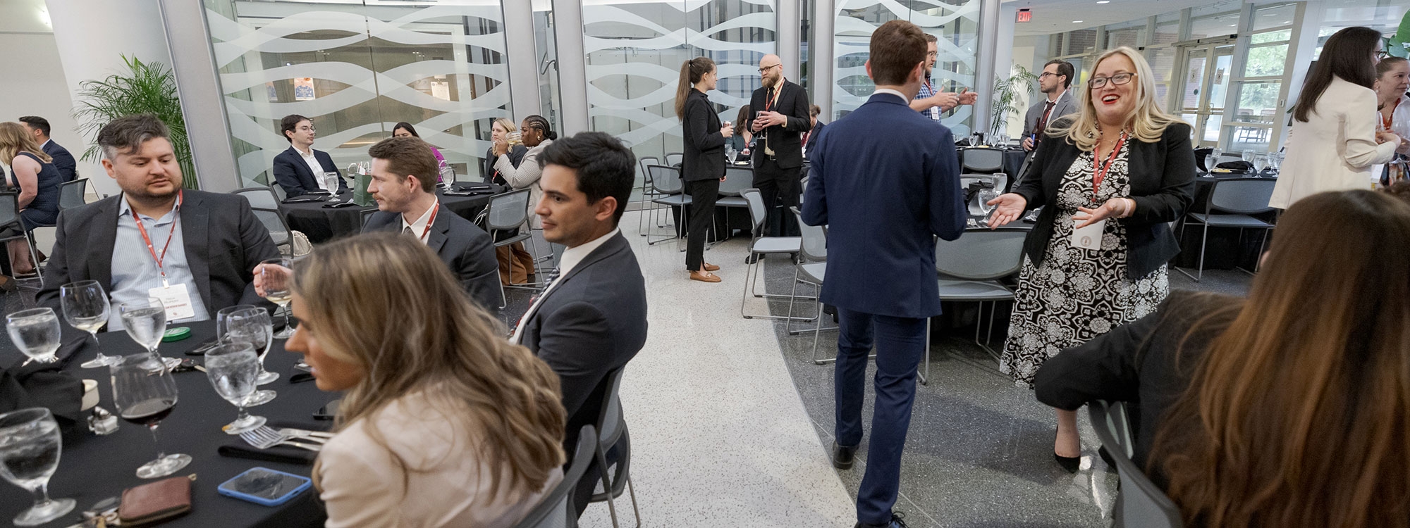 People attending an event in the National Weather Center Auditorium.