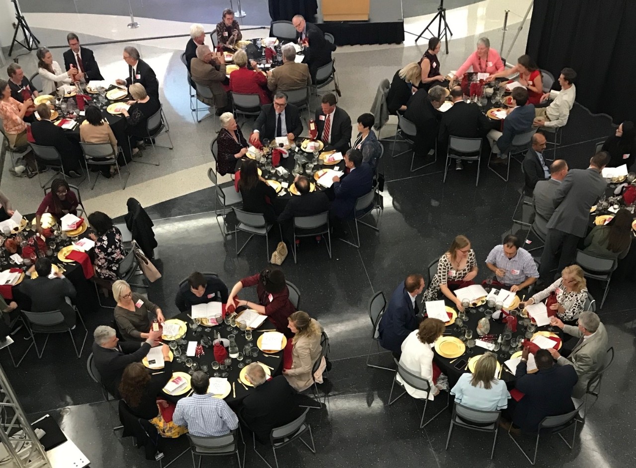 An overhead view of the Sips for Scholarships event, being held in the NWC Atrium.