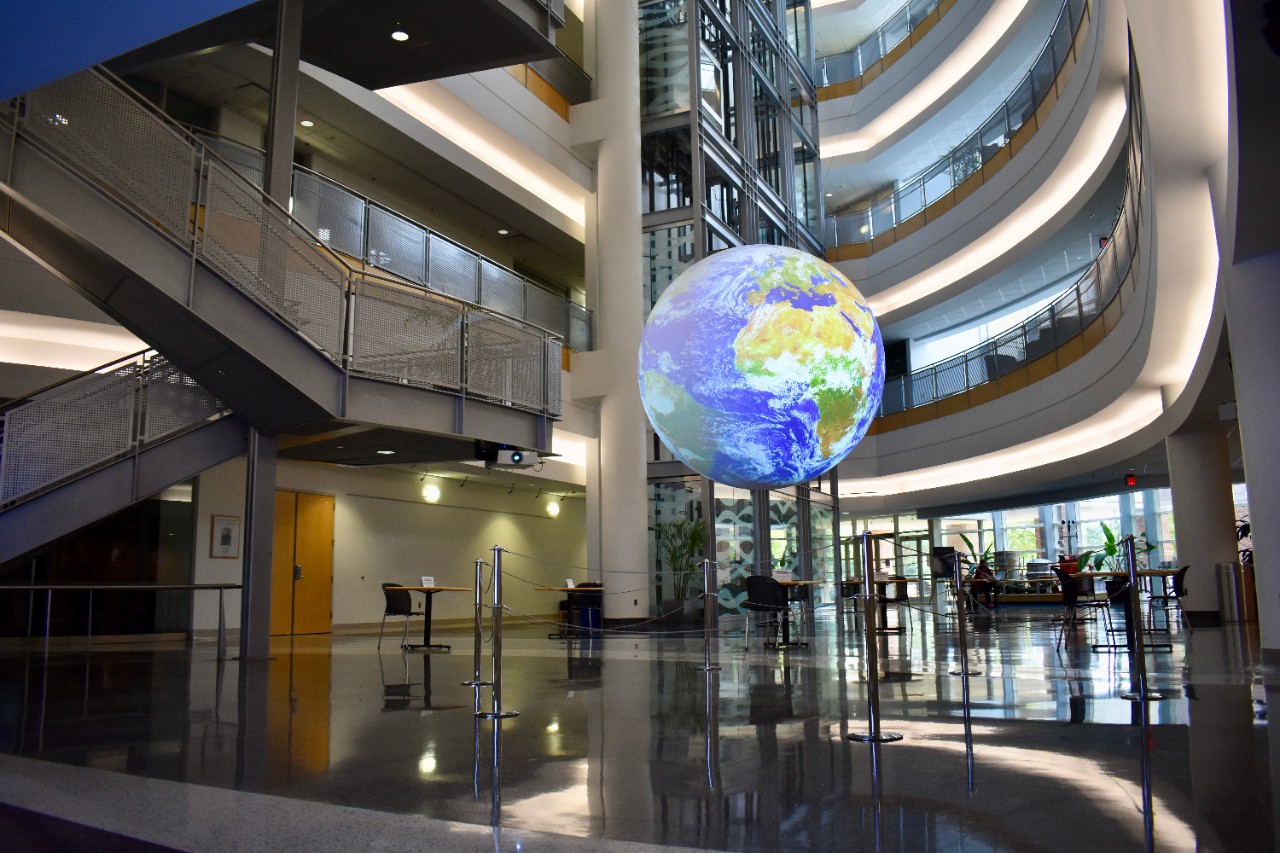 National Weather Center Atrium in 2020, featuring Science on a Sphere.