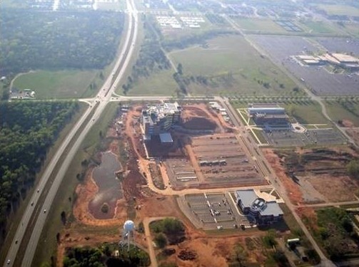 An aerial view as the National Weather Center (upper left) nears completion, early 2006. One Partners Place (lower right) and the Stephenson Research Center (upper right) were the only other buildings on the Research Campus.