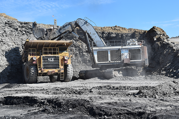 Shovel loading overburden in truck. Croweburg coal is exposed in the foreground. Phoenix Coal Company Most mine in Nowata County on June 7, 2017. 
