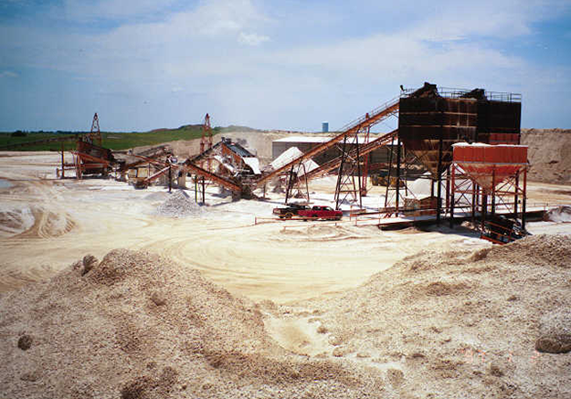 Figure 2. Gypsum quarrying here shows a portable crusher-screen-conveyor system in southwestern Oklahoma