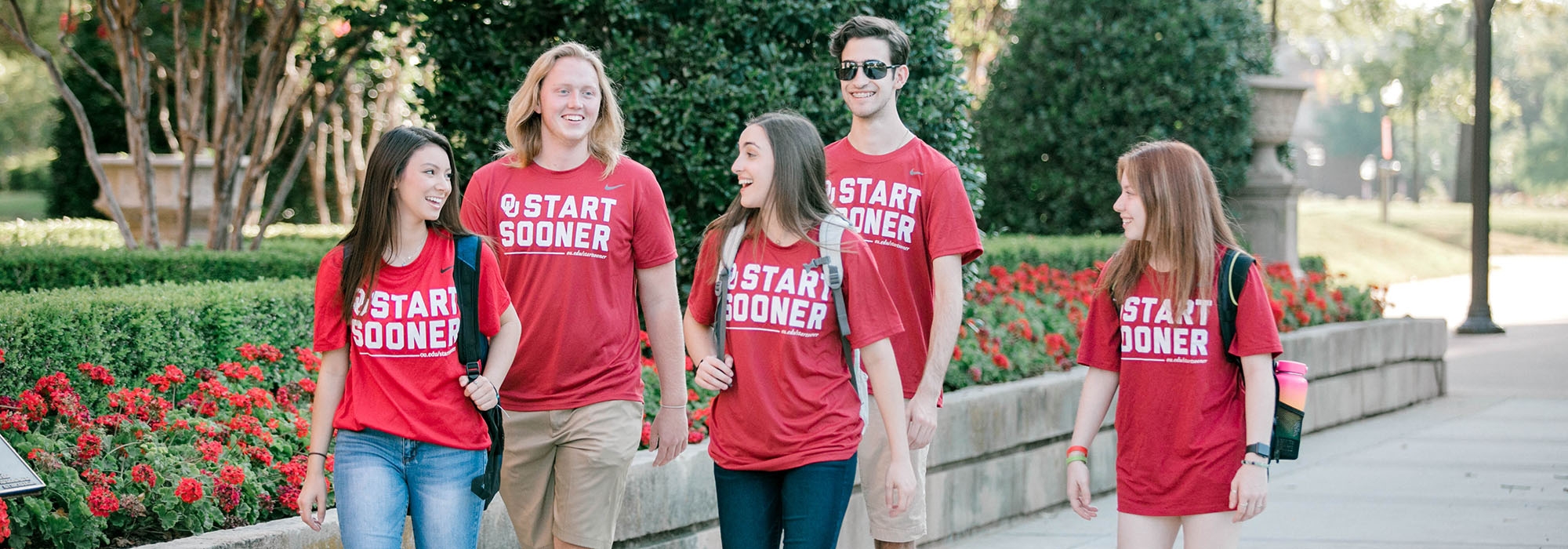Start Sooner students walking on campus at the University of Oklahoma.