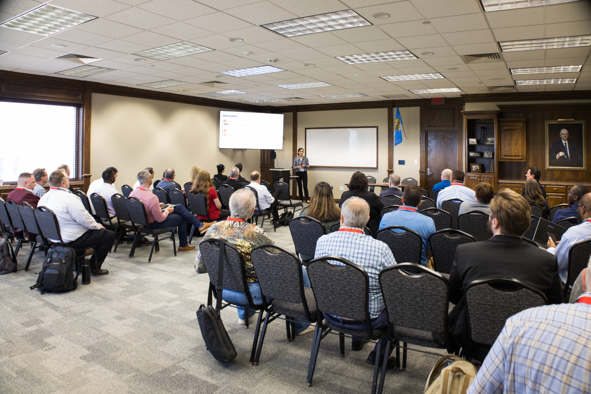 OU IT Hoda Soltani presenting to a room.