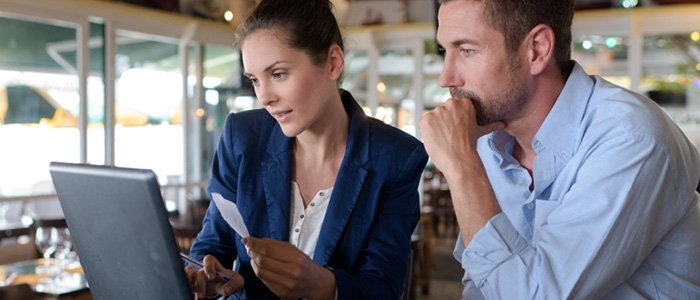 two coworkers discussing a project