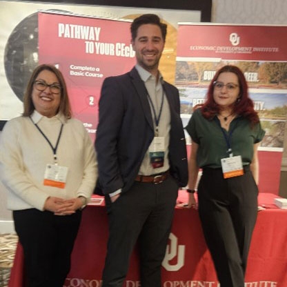 Three members of the O U E D I at the Leadership summit in D.C..