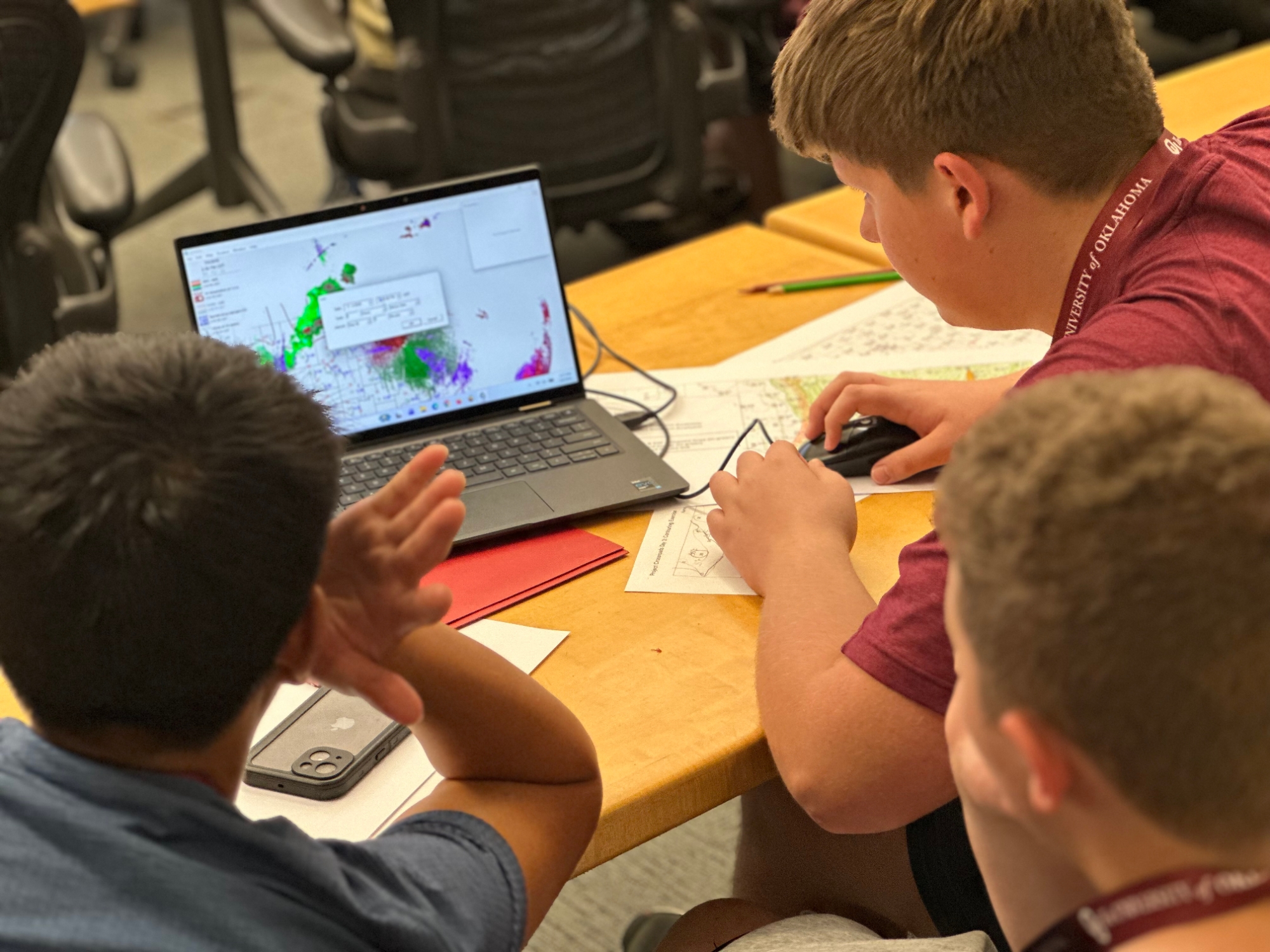 Students working on a weather research activity