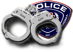 Image: Handcuffs over OUPD police patch