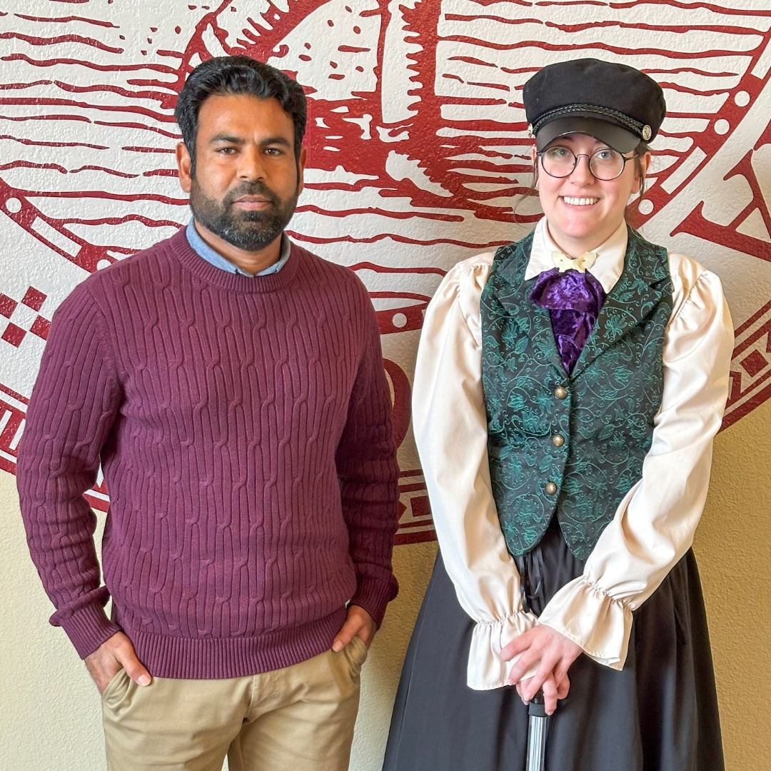 Raney and Riaz standing next to each other.