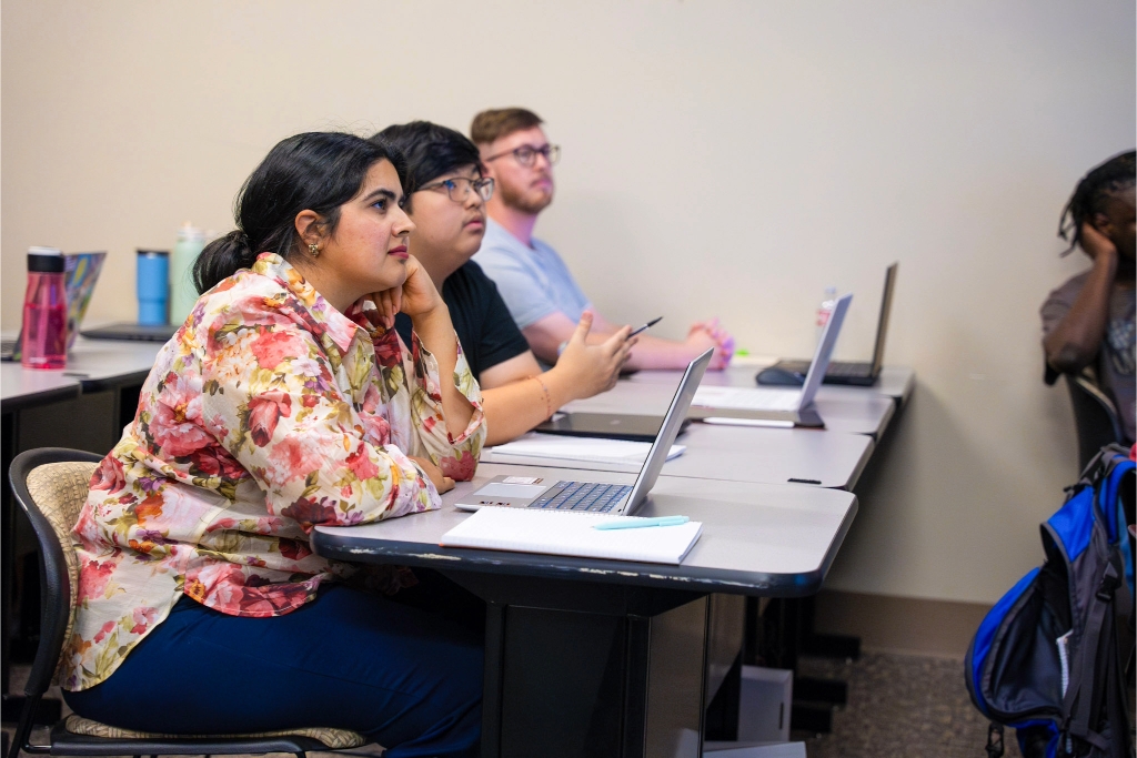 Students looking forward in class.