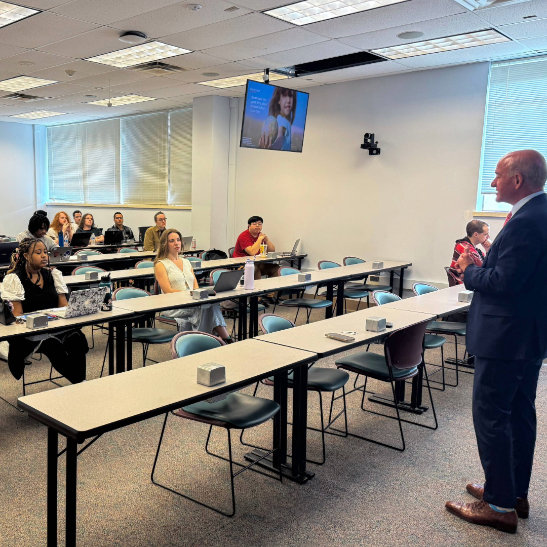 Paiva talking to the Colloquia class.