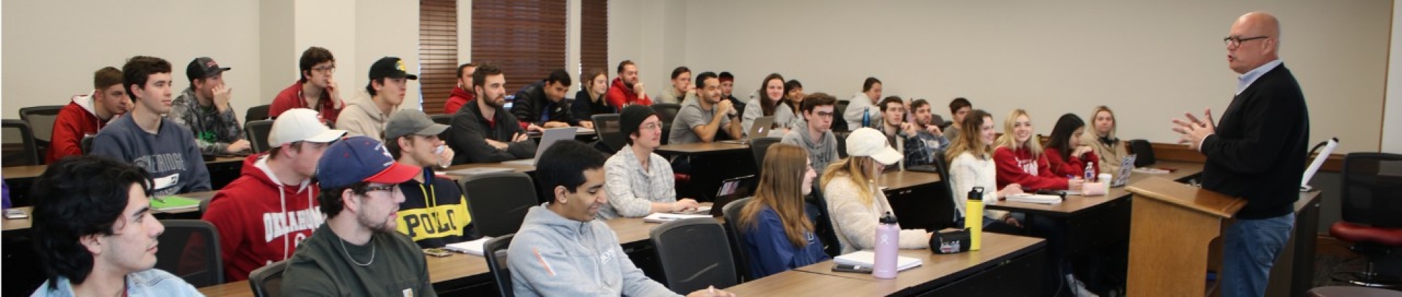 Entrepreneurship professor speaks to a room of students