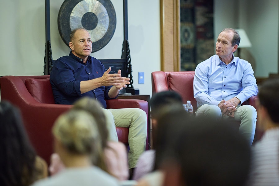 Industry professionals answering questions at a student event for Energy Management.