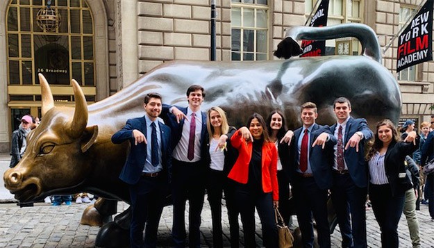 Energy Management students pose with Wall Street bull