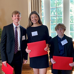 Accounting students Cooper Slay, Jamie Dewbre and Hannah Bermudez at the Price College Honors Luncheon on May 5, 2023