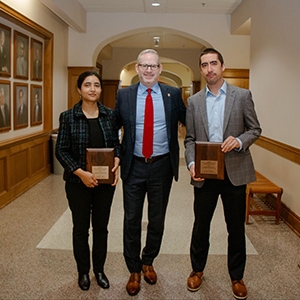 Pictured from left to right are Rimmy Tomy of the University of Chicago, Dean Corey Phelps and Andrew Sutherland of Massachusetts Institute of Technology at McLaughlin Research Conference on March 24, 2023
