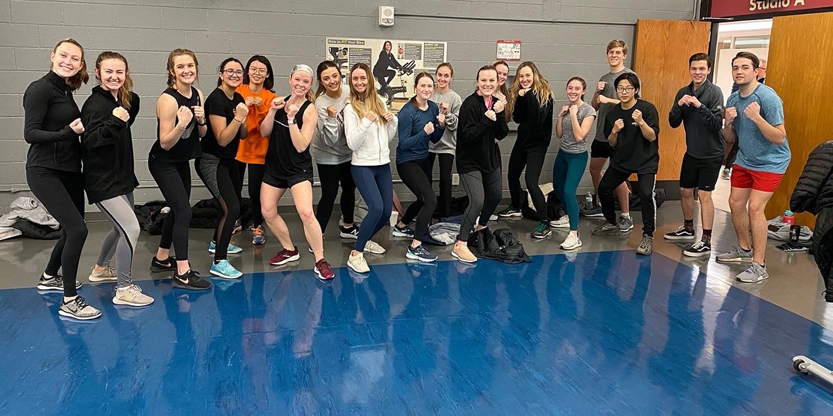 students gather for kickboxing class
