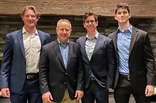 Team members Jonah Barth, Cooper Browning and Danny Dempster with professor Tom Hooper (second from left)