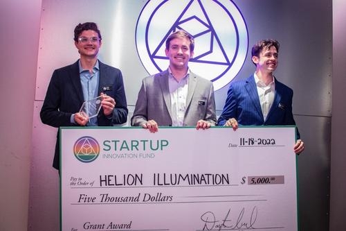 Representatives from OU Startup Programs,  Nox Wallets, Helion Illumination and Jibe Dating, proudly pose for a photo with their award check.