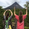 Students pose for photo in front of the mountains of Costa Rica