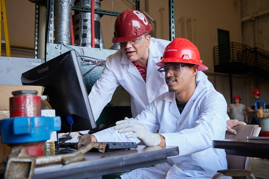Saeed Salehi (left) and doctoral student Majeed Mohmed (right), working on a geothermal project related to fluid flow in geothermal wells and testing of lost circulation materials. Image by Travis Caperton.