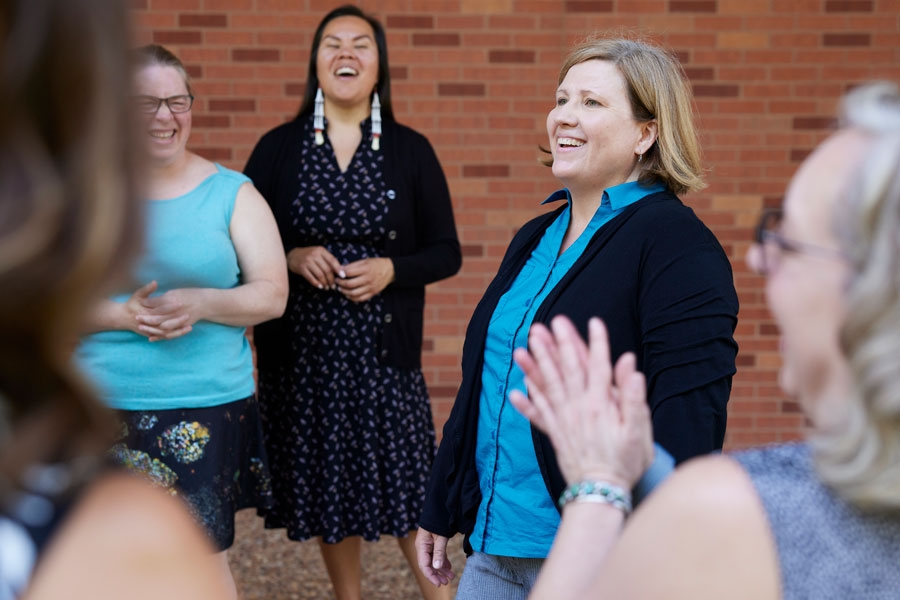Lori Anderson Snyder (center) with OU Elevate team members.