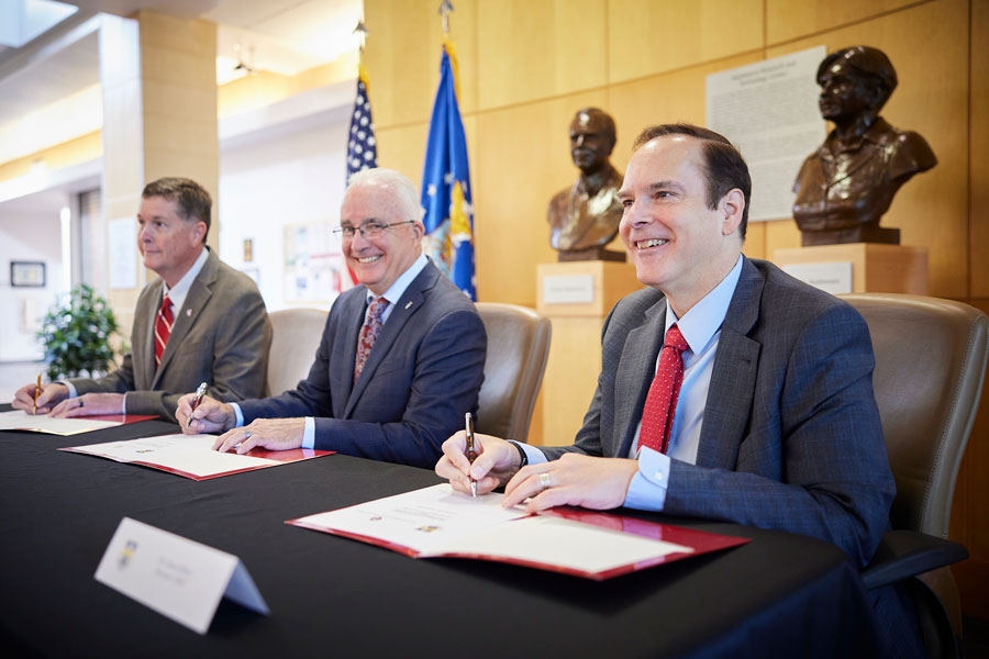 Executive Director, Oklahoma Aerospace and Defense Innovation Institute Lt. Gen. Gene Kirkland (Ret.), left, Stephen Gray, Director of the 448th Supply Chain Management Wing, center, and Dr. David Ebert, University of Oklahoma Vice President of Research and Partnerships commemorate an academic partnership Friday, Sept. 9th and a signing ceremony at the Stephenson Research and Technology Center on the University of Oklahoma campus. This first-of-its-kind academic partnership for the 448th SCMW will help them to better predict and mitigate supply chain disruptions. (U.S. Air Force Photo by Mark Hybers)