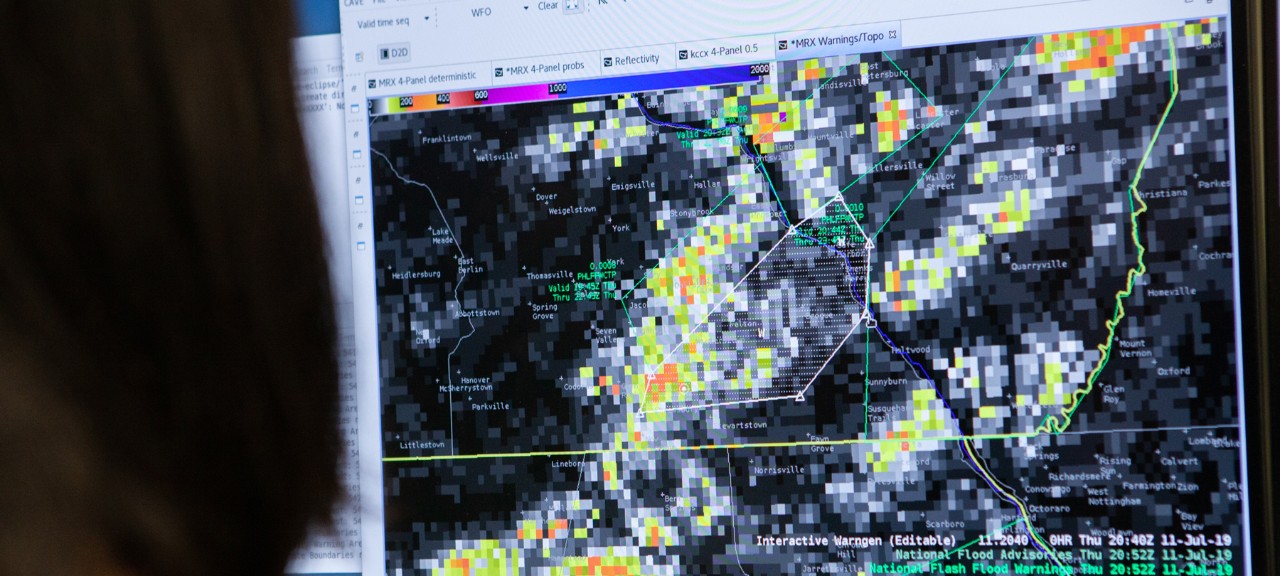 NOAA researcher monitors flash flood software