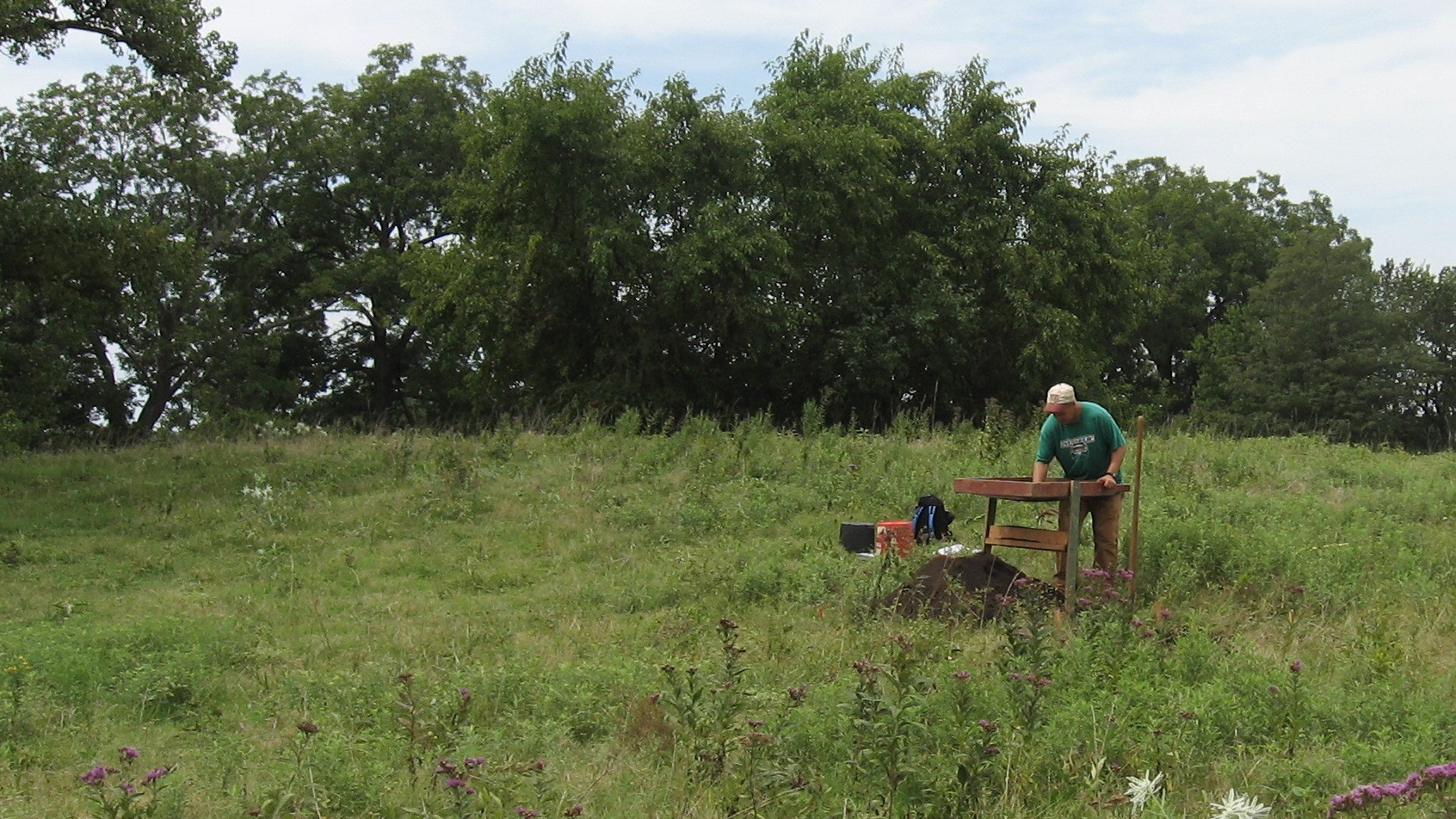 Mike McKay, an archaeologist with the ODOT Cultural Resources Program, conducting archaeological evaluative testing at a site in Coal County, Oklahoma.
