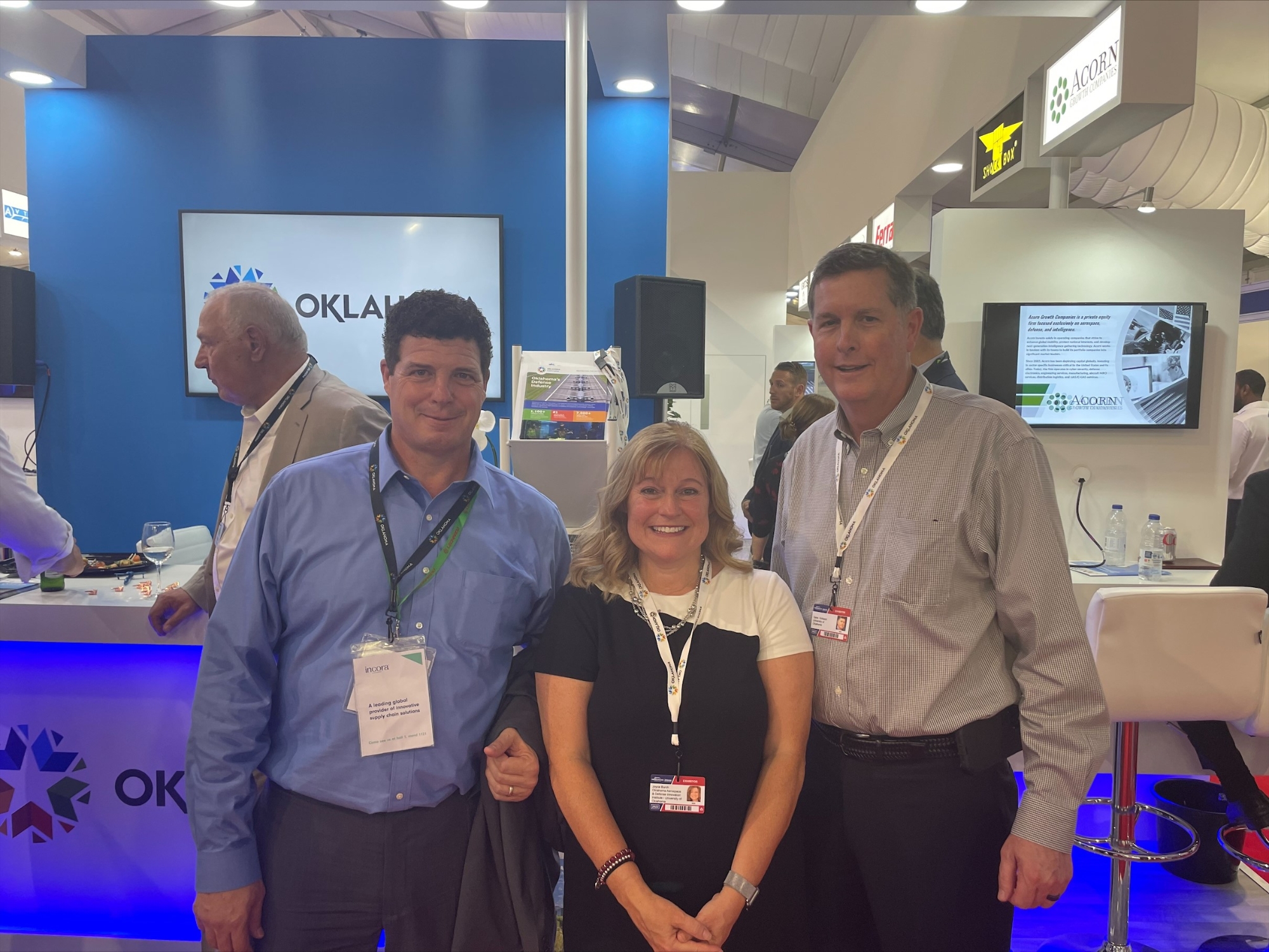 Dr. Robert Miller (left), CEO of Skydweller Aero, inc., a US -Spanish aerospace company developing renewably powered aircraft, with Joyce Burch and Gene Kirkland at the Oklahoma booth.