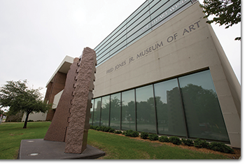 fred jones jr. museum of art exterior of building with statue in front of it