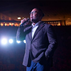 Dr. David Surratt speaking.