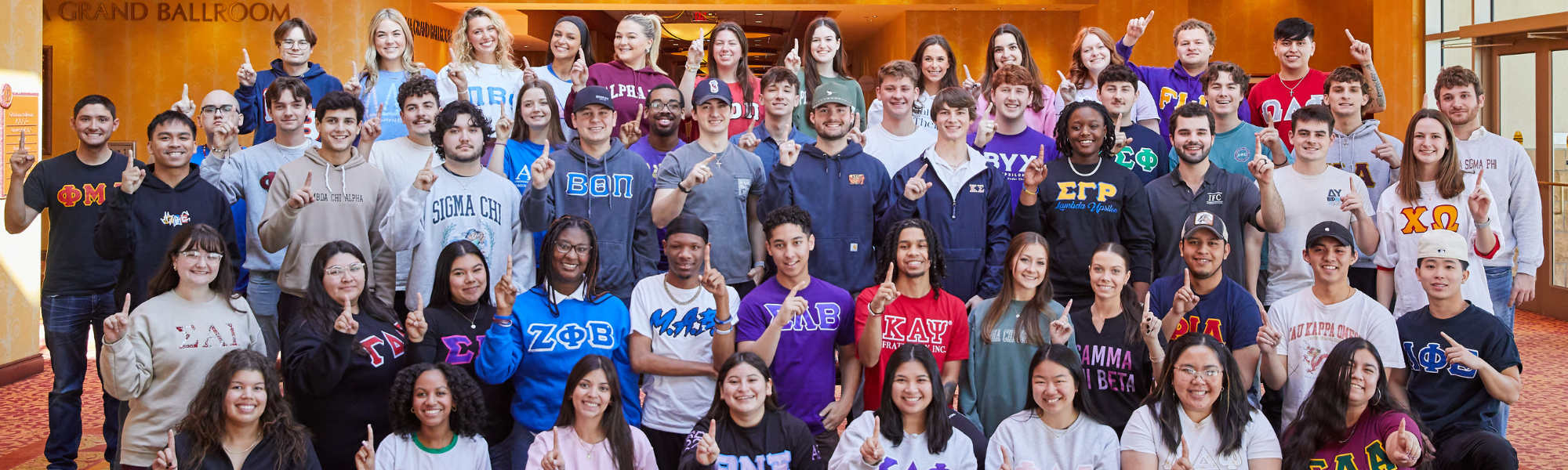 Fraternity and sorority members posing for a group photo at the FSPS leadership retreat.