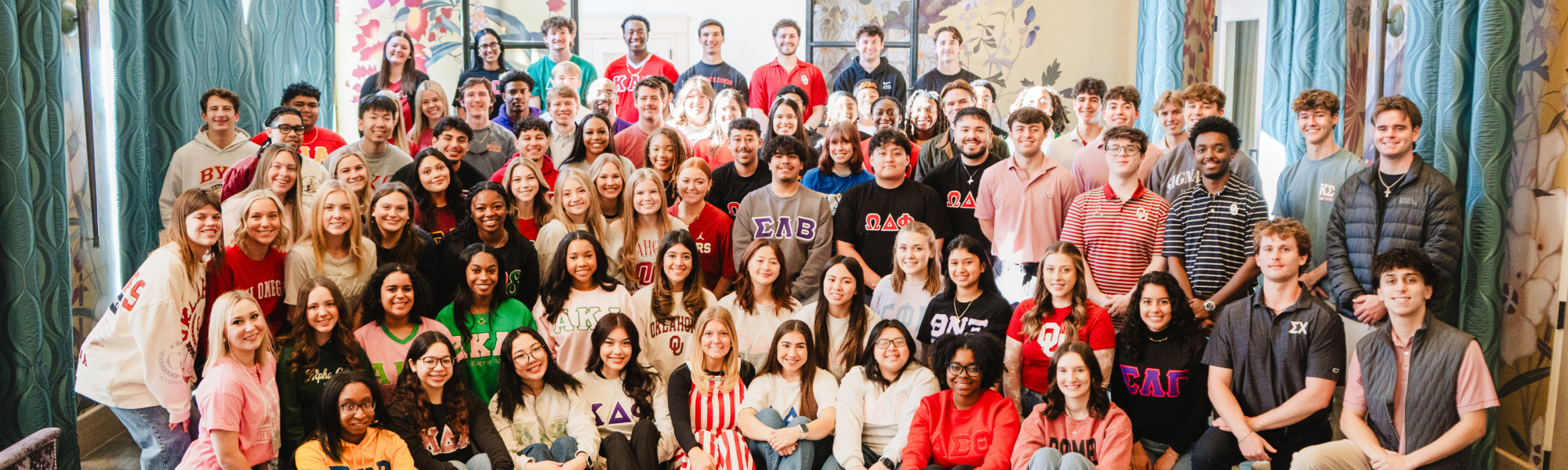 Fraternity and sorority members posing for a group photo at the FSPS leadership retreat.