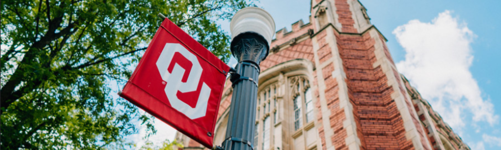 Photo of Evans Hall and OU lamppost.
