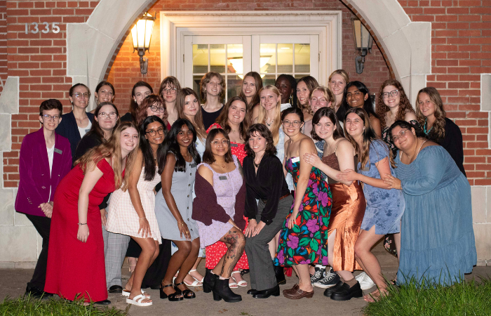 Alpha Sigma Kappa members pose for a group photo. 