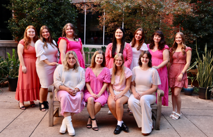 Sigma Alpha Iota members pose for a group photo. 
