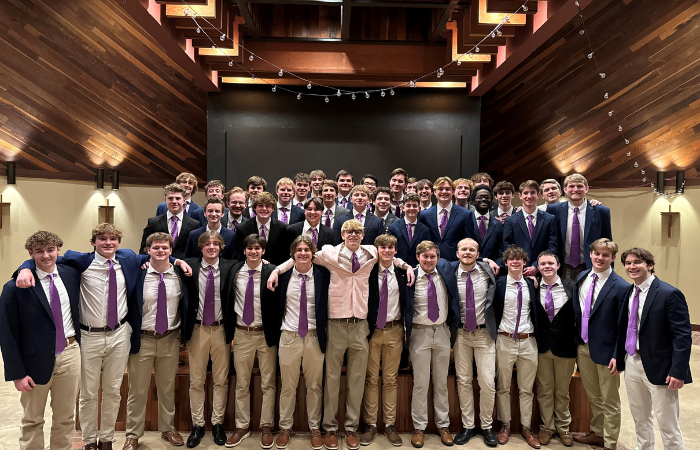 Beta Upsilon Chi members pose for a group photo. 