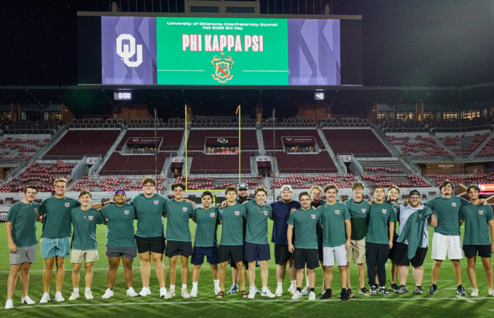 Phi Kappa Psi members pose for a group photo.