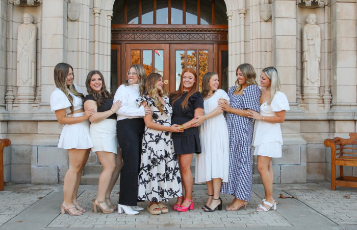 Alpha Omicron Pi members pose for a group photo.