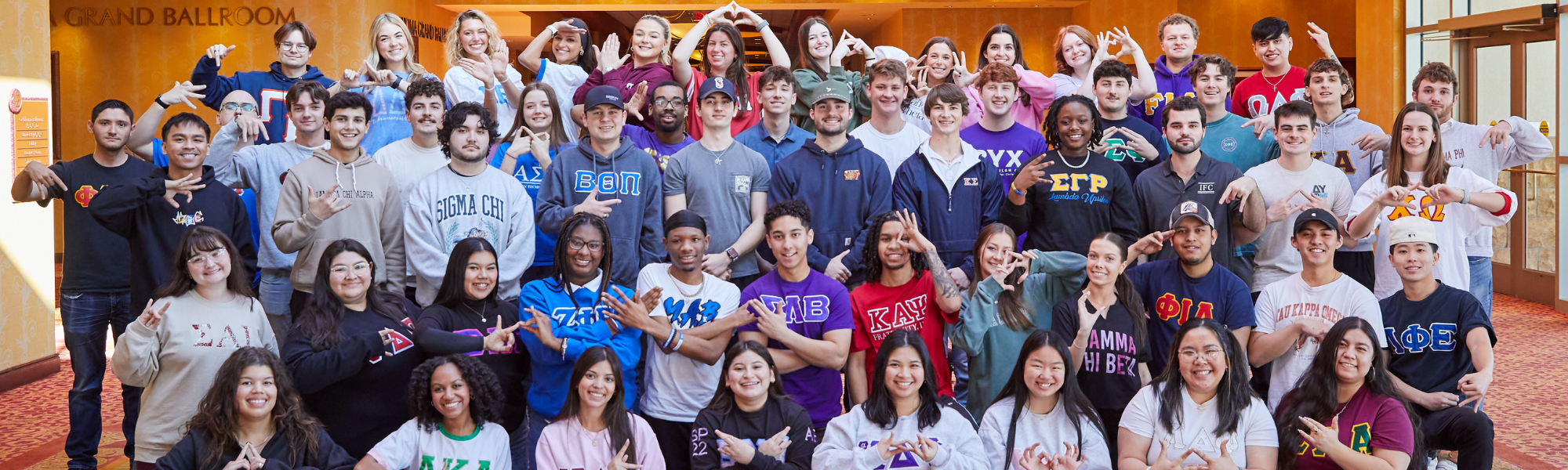 Fraternity and sorority members posing for a group photo at the FSPS leadership retreat.