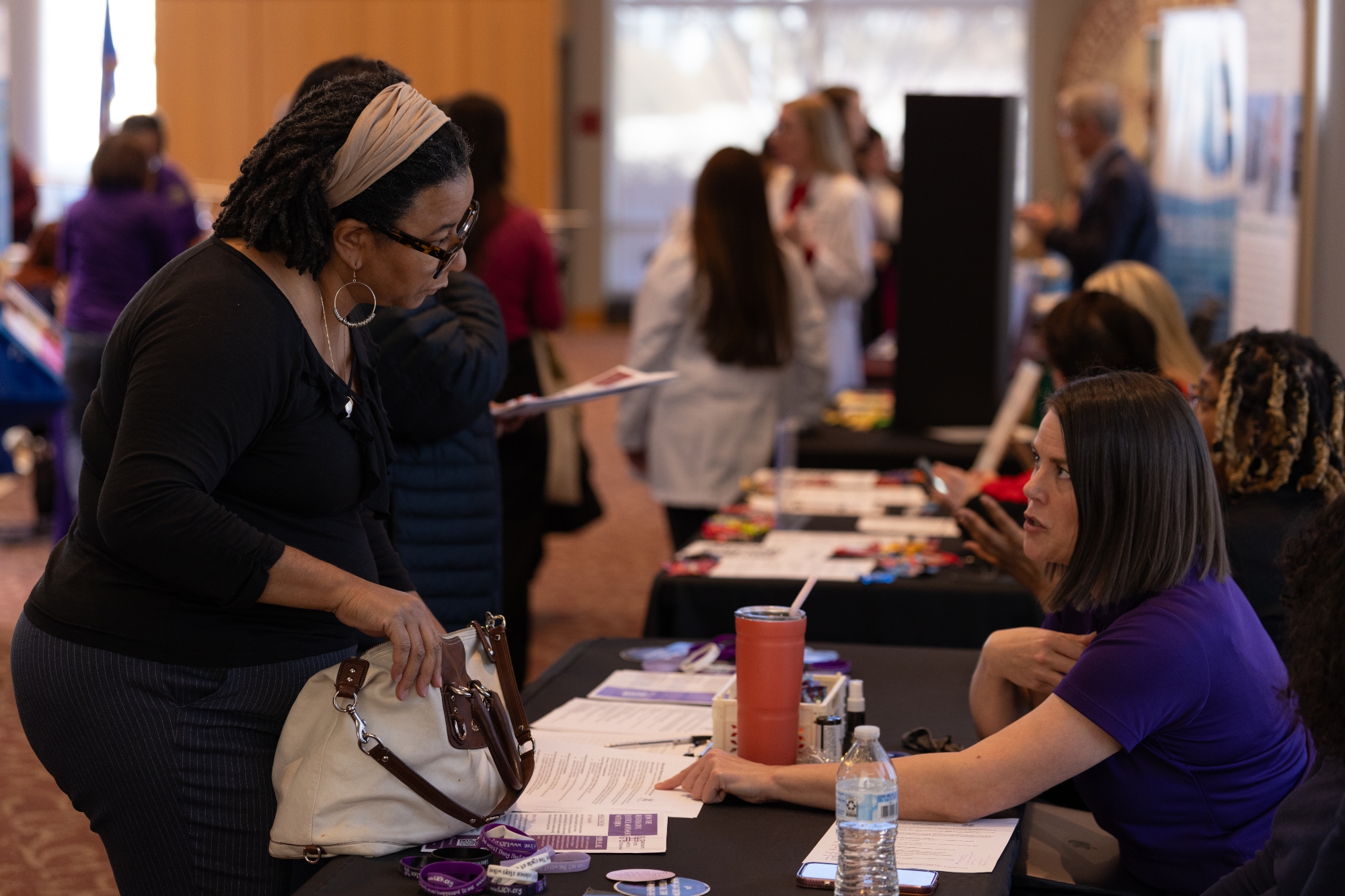 A student meets with an agency at the OU-Tulsa Social Work Practicum and Job Fair.