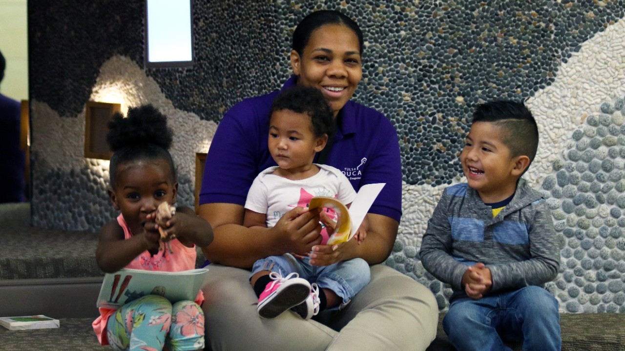 Early Childhood Education student with children