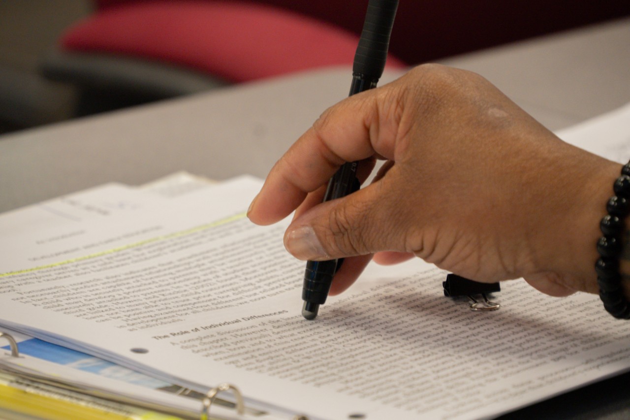 Student taking notes