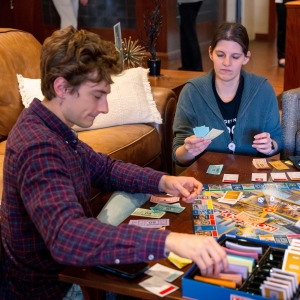 OU-Tulsa students on campus playing newly unveiled boardgame.