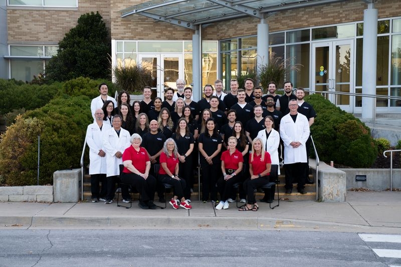 Faculty and staff posing for an OU DEM group photo.