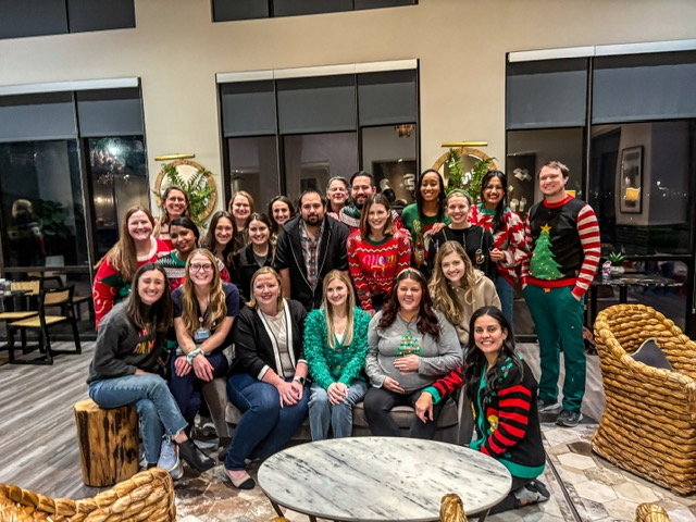 Large group of pediatric residents celebrating the holidays together.