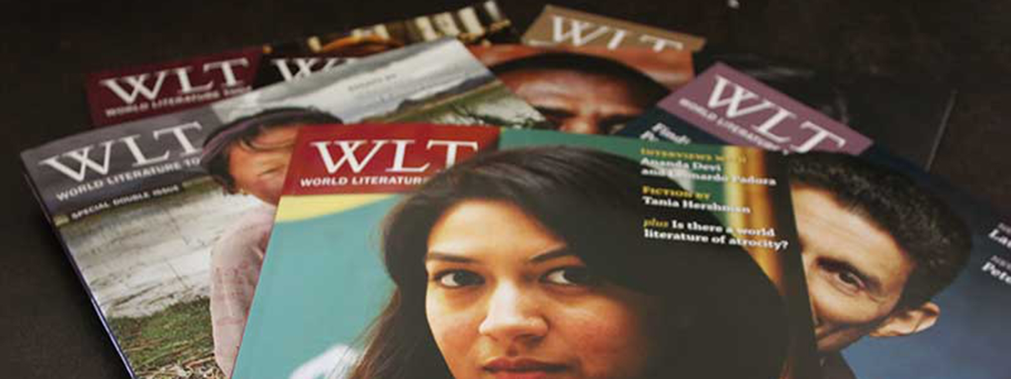 World Literature Magazines stacked and displayed on a table.