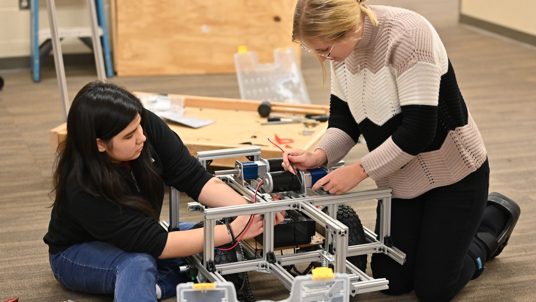 Members working on the robot